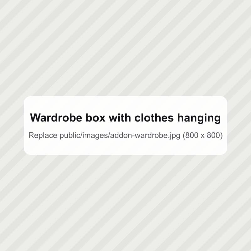 A wardrobe box with clothes hanging inside