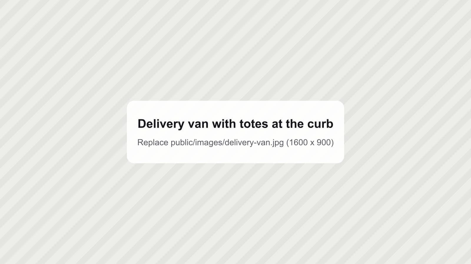Delivery van parked at the curb with a stack of totes being unloaded
